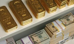 zoloto dollar 300x179 - золото доллар
